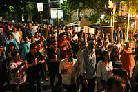 PTI : People during a candlelight march in protest against the alleged rape and murder of a trainee woman doctor at the RG Kar Medical College and Hospital, in Kolkata, Wednesday